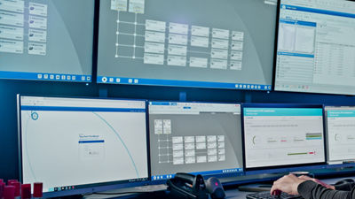 Control room, data on computer screens