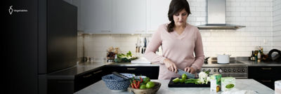 Woman cooking asian food, fresh and packed vegetables