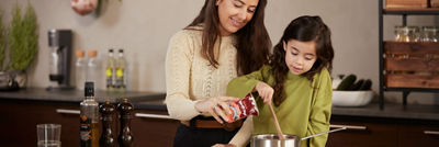 Woman in store with package in hand