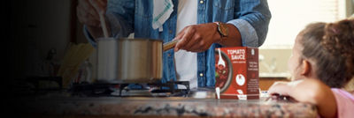 Cooking with tomato sauce in Tetra Recart carton