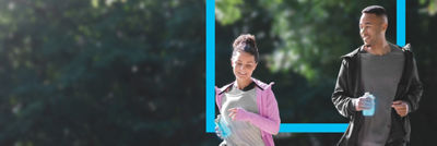 Man and woman running with Tetra Pak carton in hands