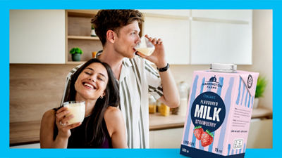 Young couple drinking milk