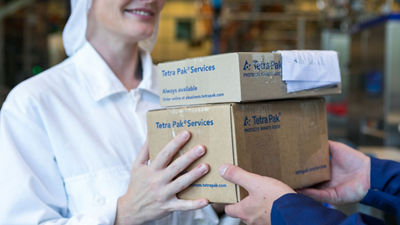 Spare parts delivery, parts in cardboard boxes