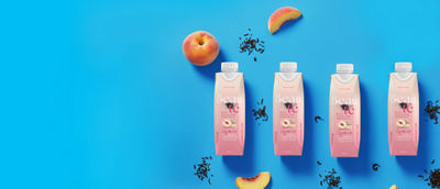 four cartons on a blue background