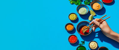 sauces on blue background