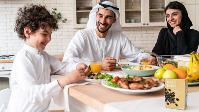 Family having dinner, beans in Tetra Recart carton package