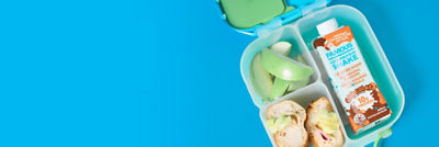 Lunchbox with Famous kids protein shake, apples and sandwiches.