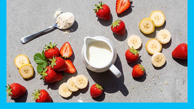 Milk in jug and fresh fruit