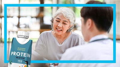 Senior women sharing information and Tetra Prisma Aseptic carton