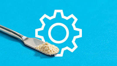  postbiotic powder on blue background 