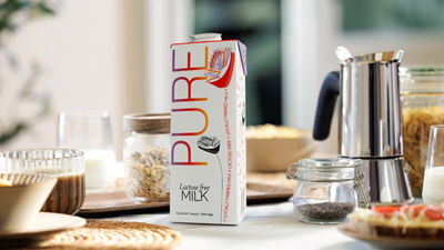 Breakfast table, lactose free milk in Tetra Brik Aseptic carton