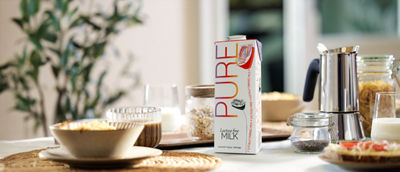 Breakfast table, lactose free milk in Tetra Brik Aseptic carton