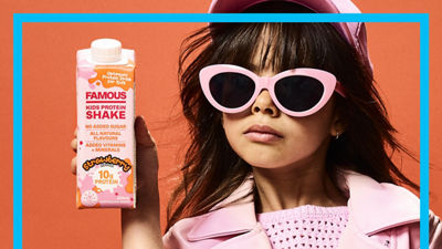Girl with Famous kids protein shake.
