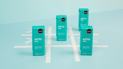 Green Hatsu rtd tea packages, 3 in a row.