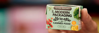 hand holding a tetra recart 100 mini package