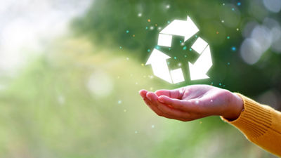 Hand and recycling symbol