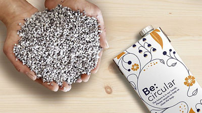 Hand with polymers and a package