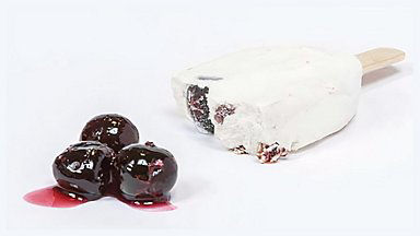 Cherries and an ice cream on a stick