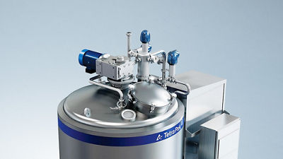 Industrial mixing equipment used for blending powder and liquid ingredients in ice cream production