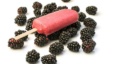 ice cream stick on blackberries