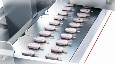 Single-serve ice cream with large inclusions perfectly aligned on trays