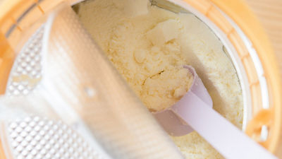 Infant formula powder in jar