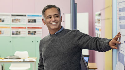 Man pointing at whiteboard