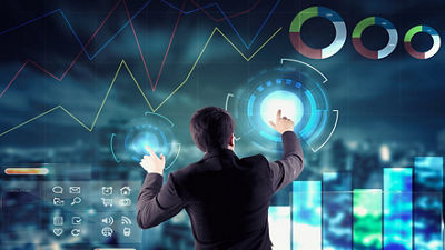 Man pressing largre touch screen in front of him