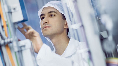 Tetra Pak upgrades, operator configuring equipment