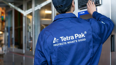 Tetra Pak worker looking at machine