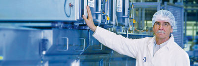 man next to a machine