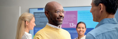 man in yellow pullover