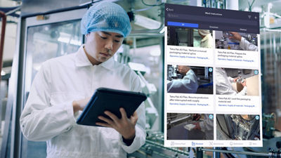 Man holding ipad in factory