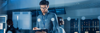 man looking at a computer