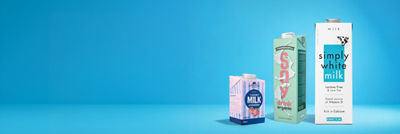 Milk and soy beverage in Tetra Brik carton packages
