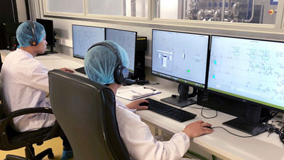 Operators in control room at DenEast