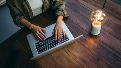 Man typing on computer