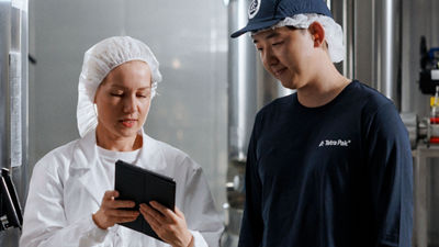 Plant staff looking at tablet