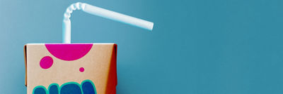 Carton package with straw