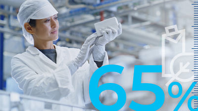 woman in lab with the number 65