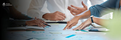 Printouts with graphs and data on table