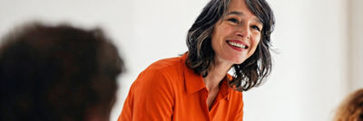 Woman participating in business meeting discussion