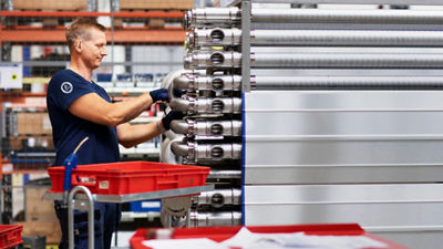 processing components heat exchanger maintenance worker