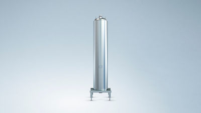 Coiled heat exchanger for heating and cooling applications