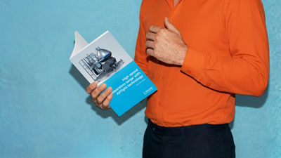 Person holding separator processing brochure