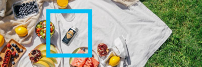 Picnic: fruits, berries, salad and Tetra Prisma Aseptic carton 