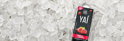 RTD tea Yai package on ice cubes.