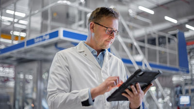 Service engineer with tablet