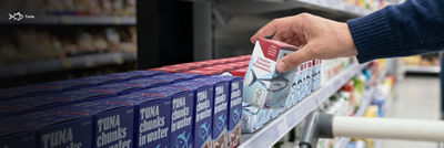 Tuna in Tetra Recart cartons on shelf in grocery store