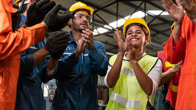 Skilled workers clapping